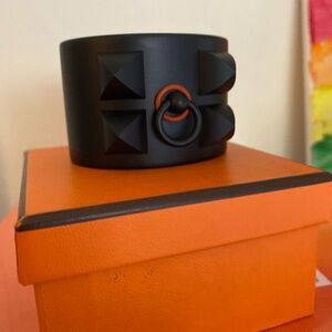 Hermès Cuff Bracelet.  Sunset Matte Black Aluminum with Rare Orange Ring, T2